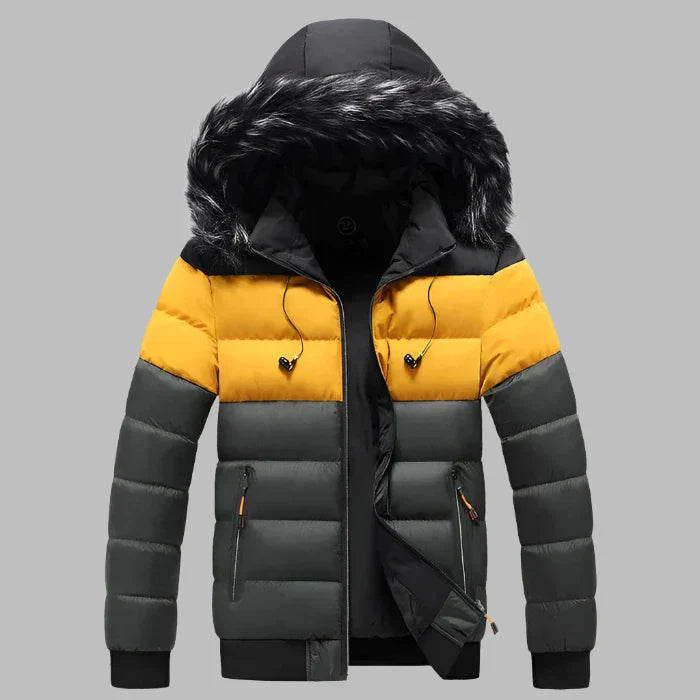 Gelbe und graue Winterjacke mit Kapuze und Kunstfellbesatz, gesteppte Daunenoptik, Reißverschlusstaschen, modisch und warm, ideal für kaltes Wetter.