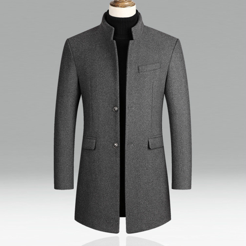 Grauer Herrenmantel aus Wolle, elegant und modern, mit Stehkragen und Knopfleiste. Perfekt für Herbst- und Wintermode.