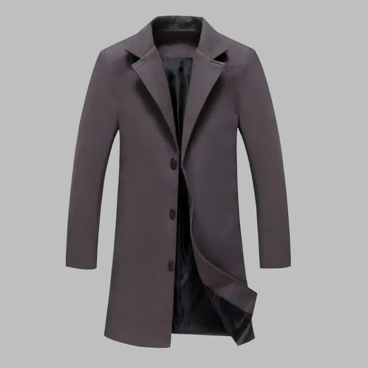 Grauer Herrenmantel aus Wolle, elegant und modern, mit Knopfleiste und Reverskragen, ideal für Herbst- und Wintermode.