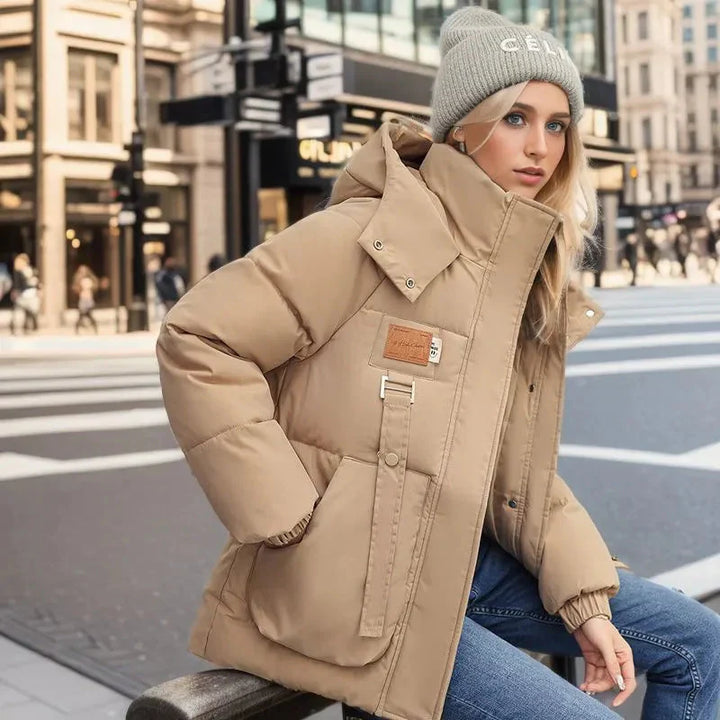 Damen Winterjacke – Warmer Daunenmantel mit Kapuze für kalte Tage
