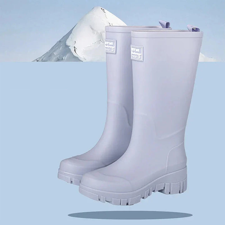 Regenstiefel für den Herbst - Schwarze Chelsea Gummistiefel mit Blockabsatz und Profilsohle für Damen