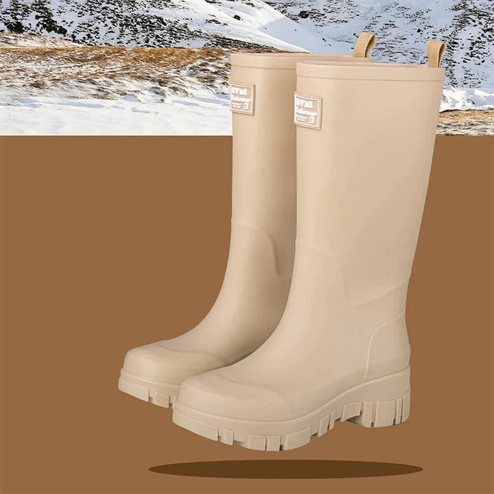 Regenstiefel für den Herbst - Schwarze Chelsea Gummistiefel mit Blockabsatz und Profilsohle für Damen