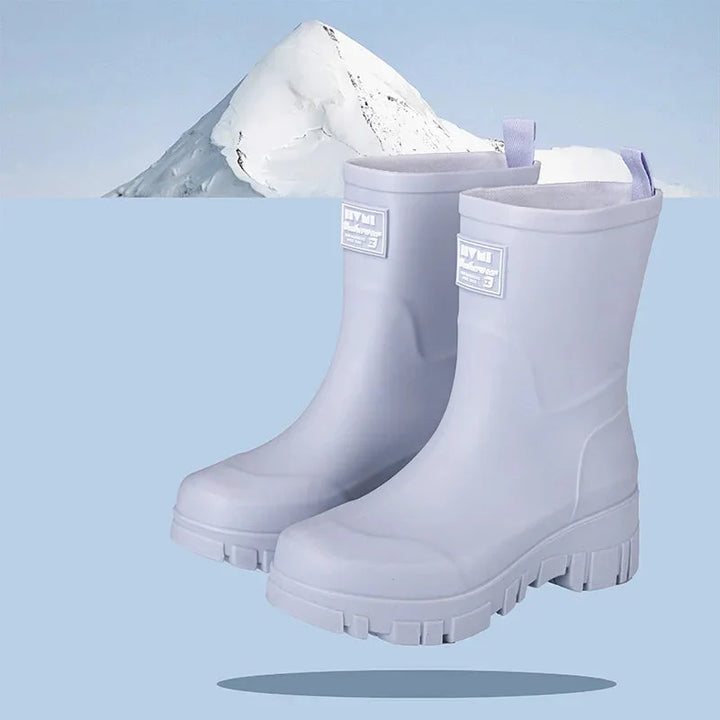 Regenstiefel für den Herbst - Schwarze Chelsea Gummistiefel mit Blockabsatz und Profilsohle für Damen