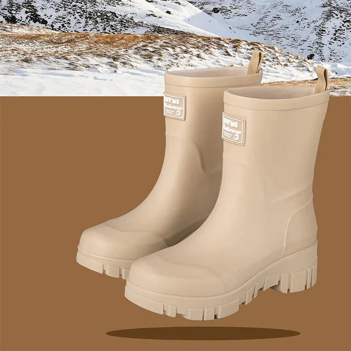 Regenstiefel für den Herbst - Schwarze Chelsea Gummistiefel mit Blockabsatz und Profilsohle für Damen